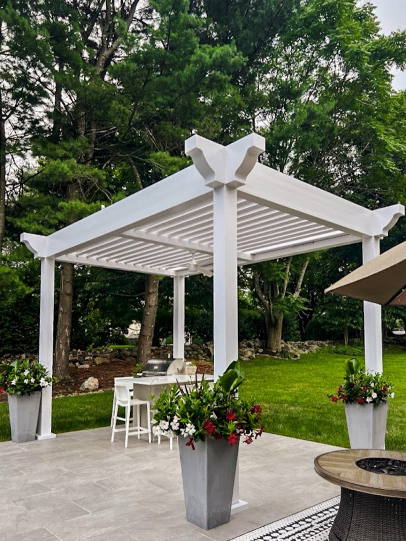 Classic pergola with ornate brackets and columns